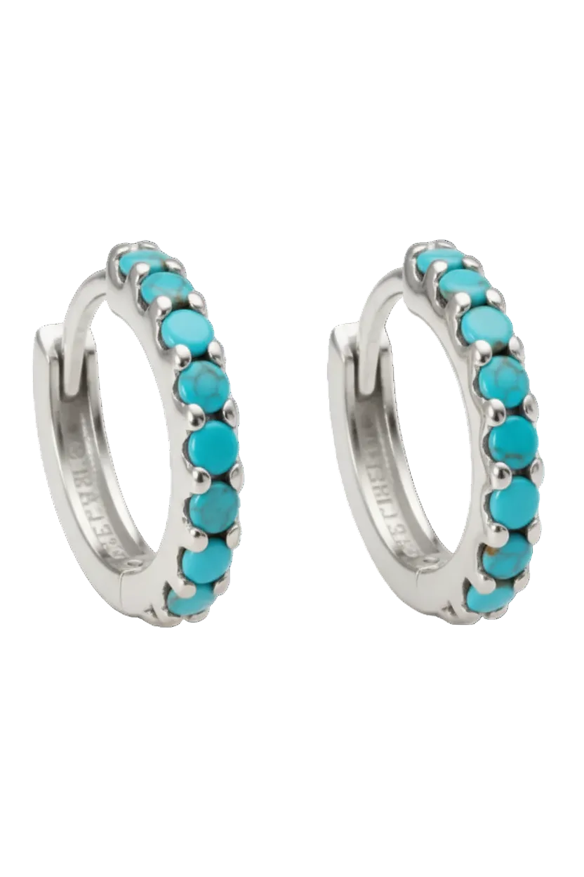 Silver hoop earrings with turquoise stones on a white background