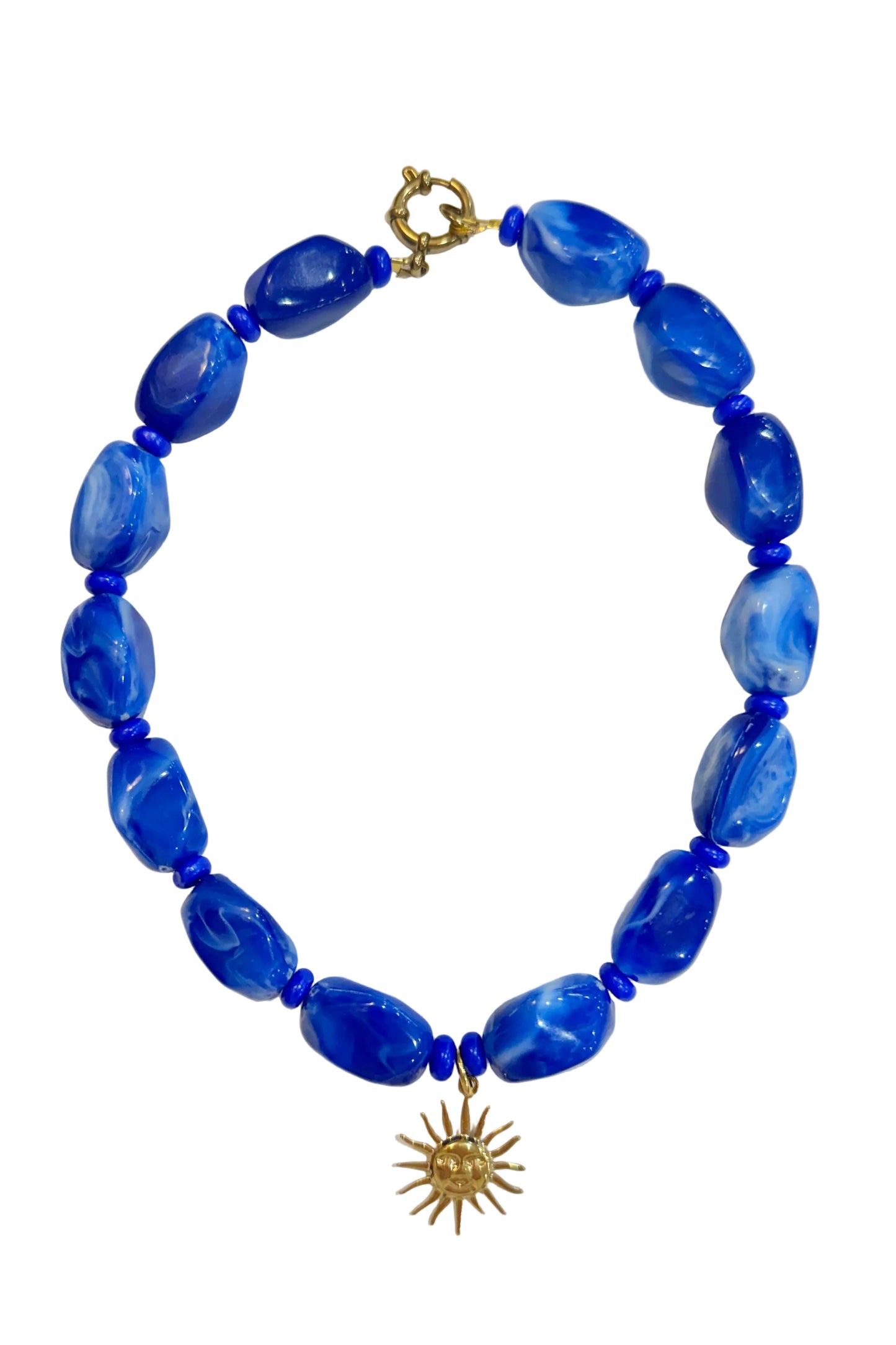 Blue beaded necklace with a sun pendant on a white background