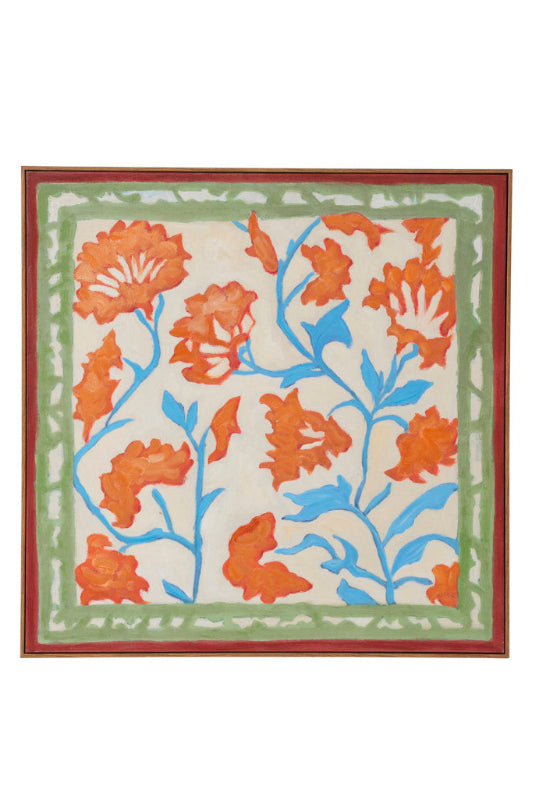 A square framed textile or wall hanging with a floral pattern. The design features orange flowers and blue stems on an off-white background, bordered by green and red stripes.
