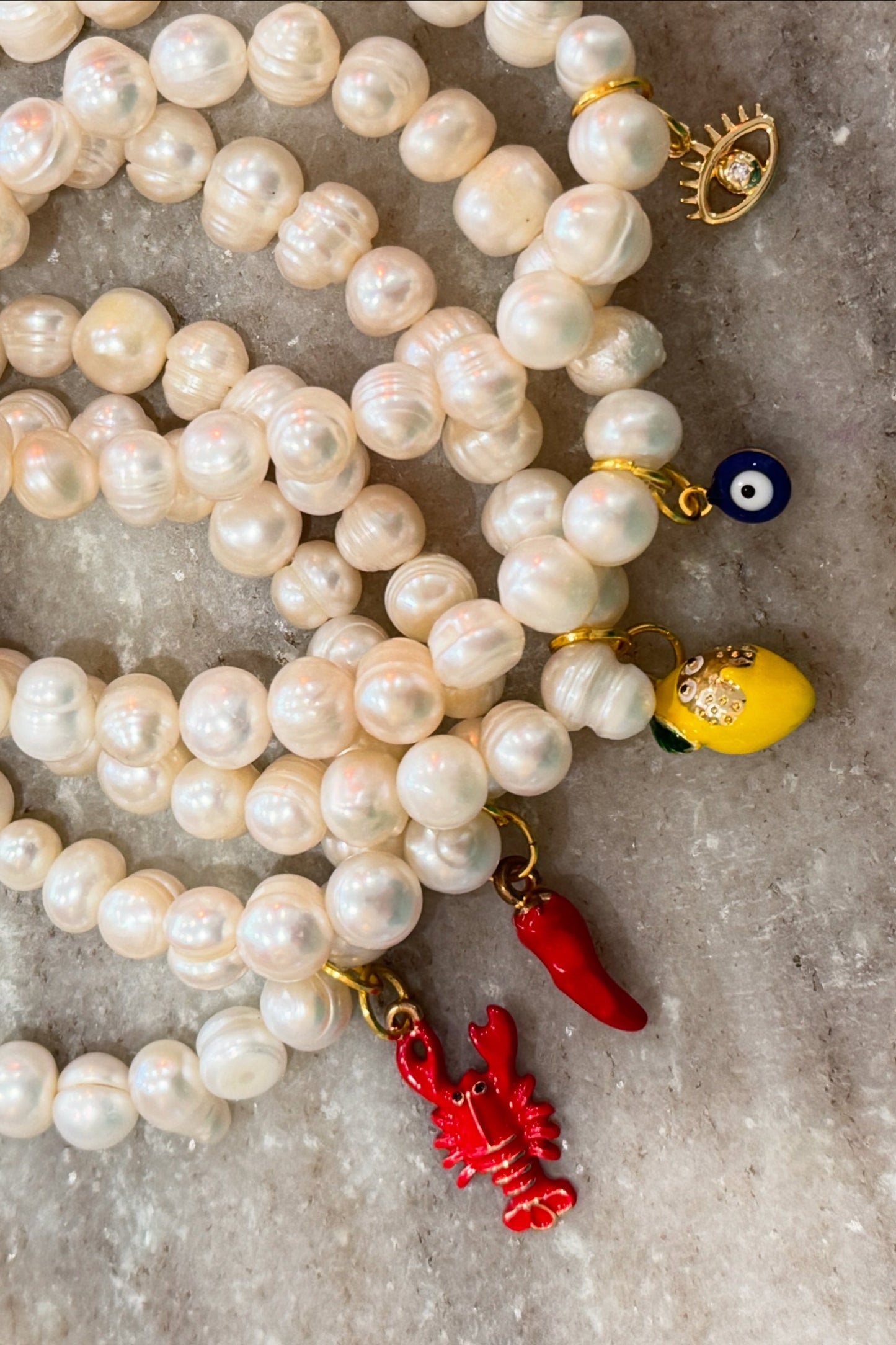 Charm'd Pearl Bracelets