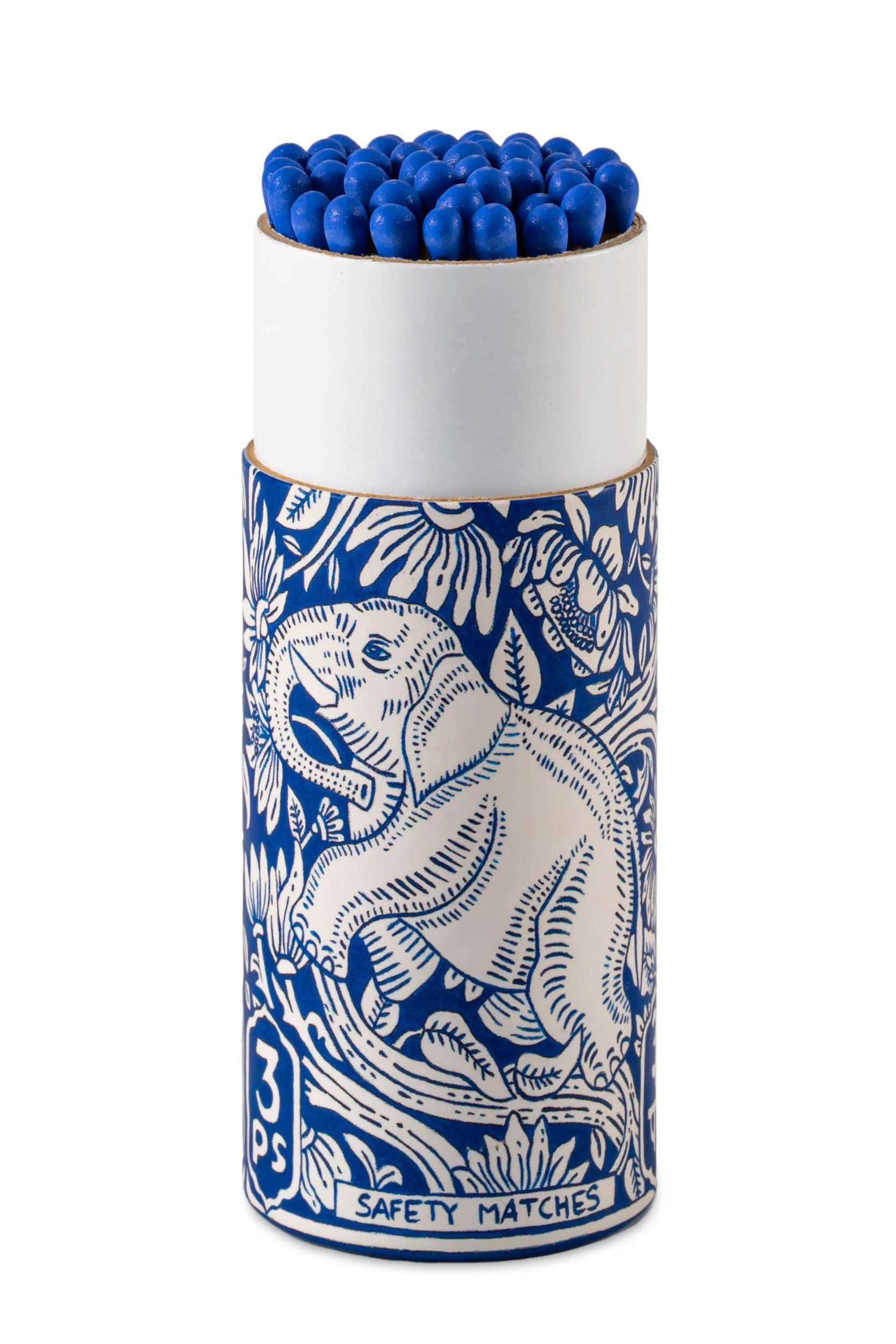 Cylindrical matchbox with blue matches and a decorative pattern on a white background