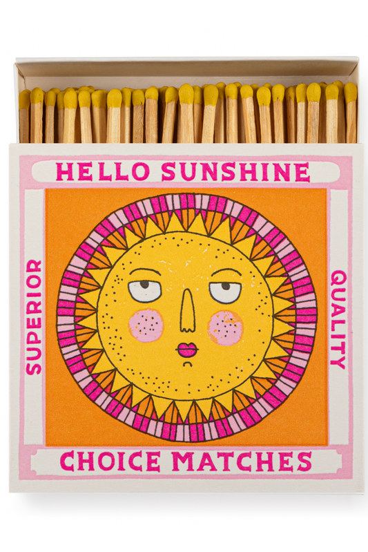 Matches in a box with a sun design and 'Hello Sunshine' text on a white background