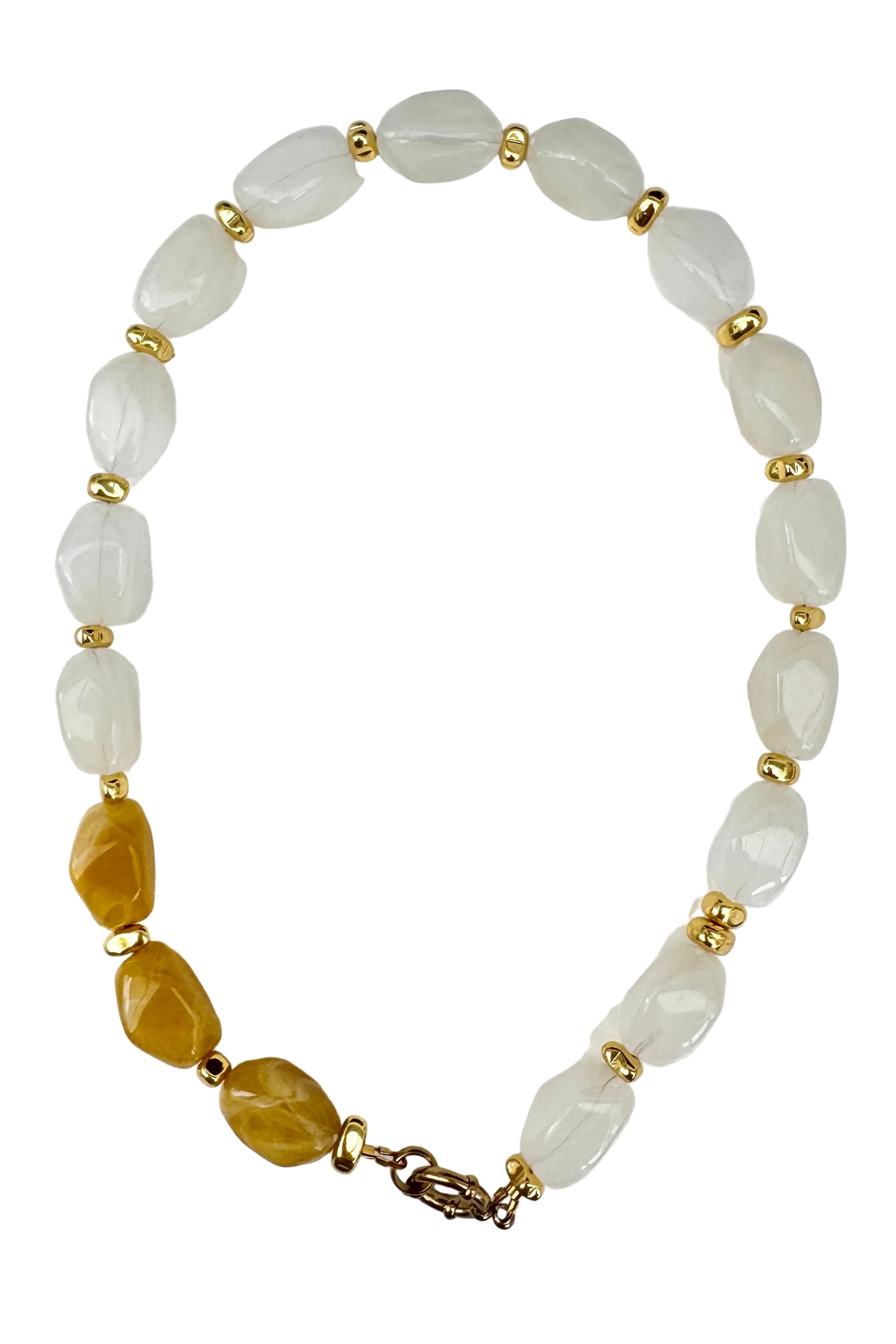 Beaded bracelet with white and gold beads on a white background