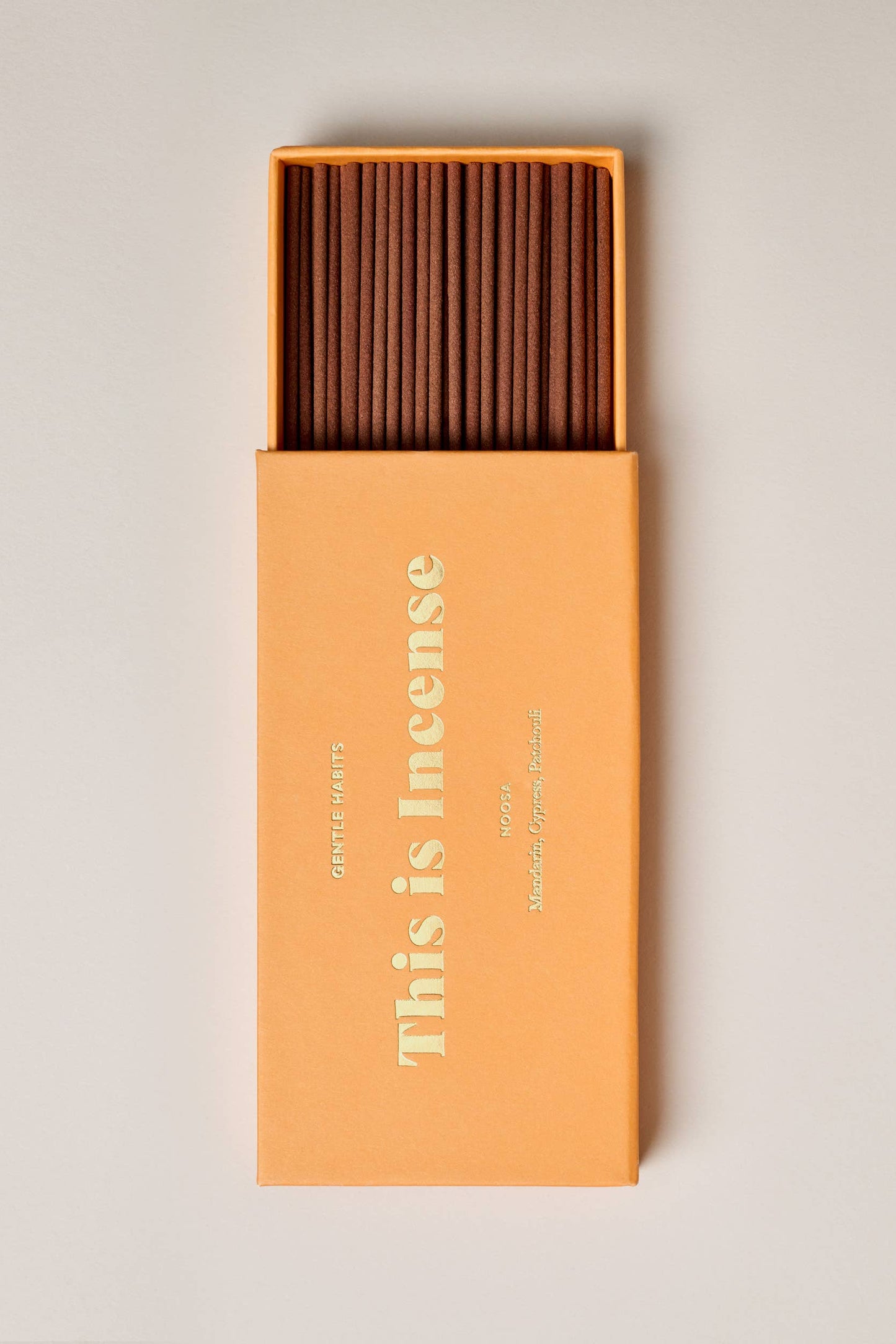 Box of incense sticks with 'This is Incense' branding on a light background
