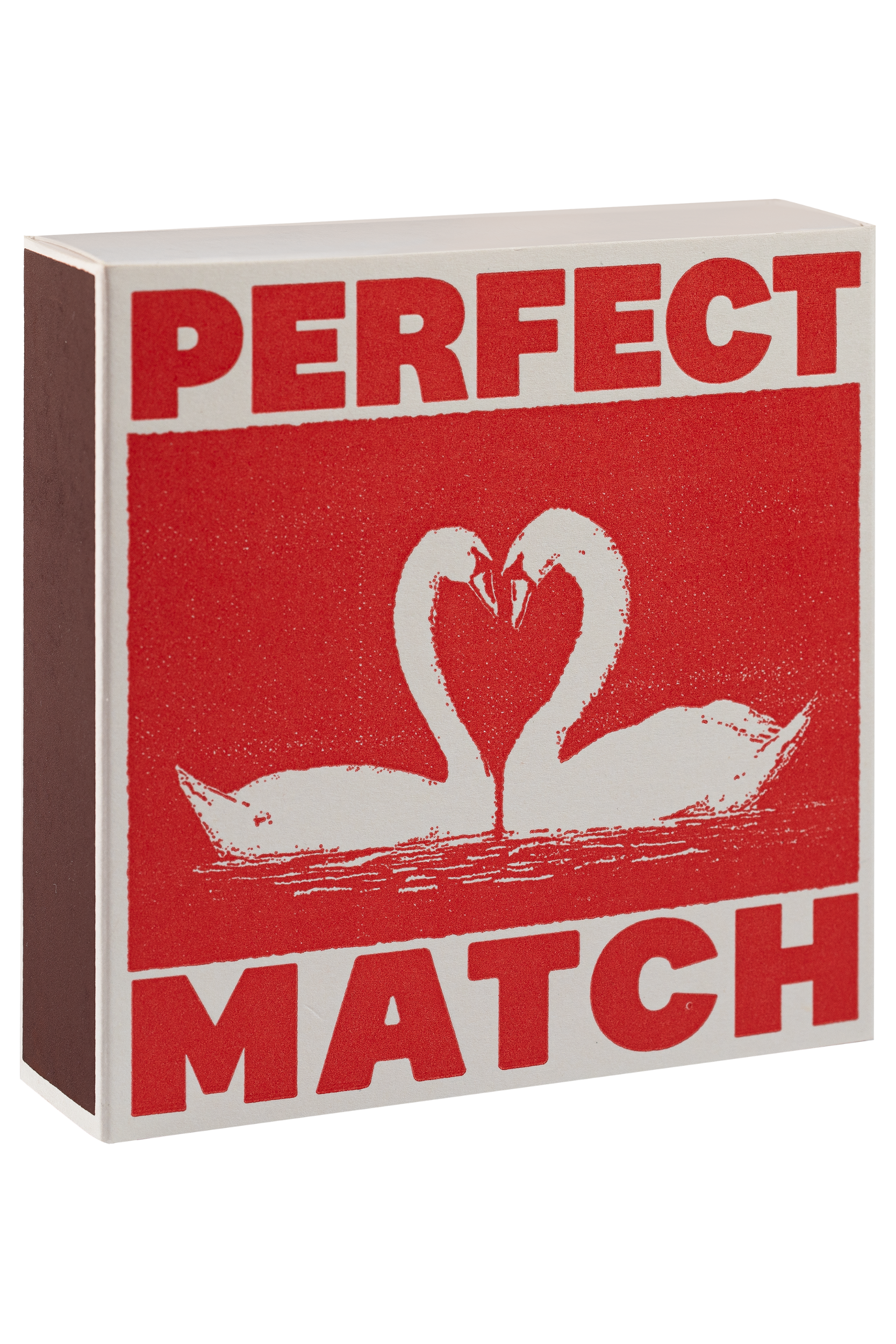 Box with 'Perfect Match' text and swan illustration on a red background