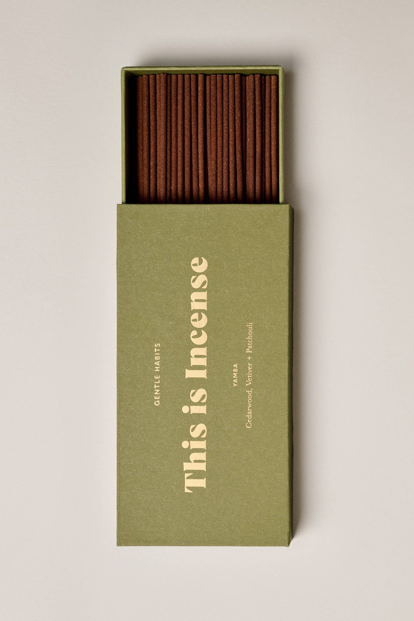 Incense sticks in a green box with 'Gentle Habits' branding on a beige background