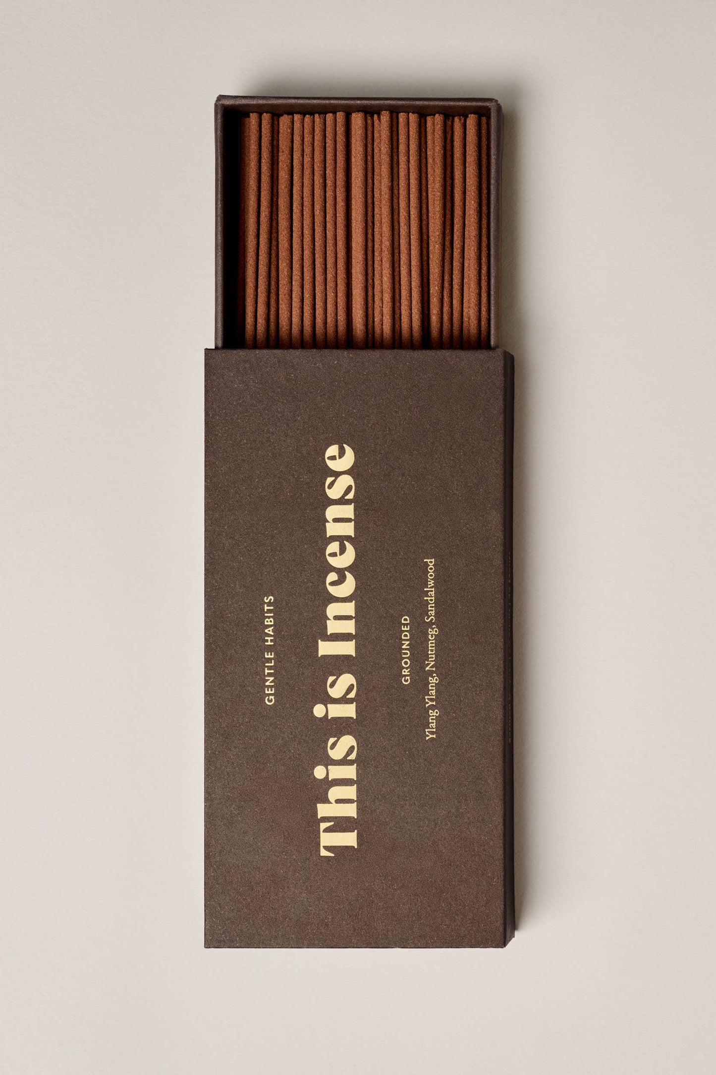 Incense box with 'This is Incense' text on a beige background