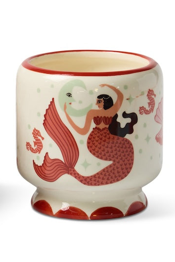 Mermaid-themed mug with matching packaging on a white background