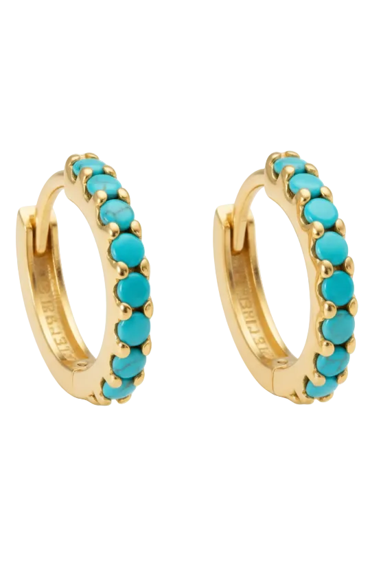 Gold hoop earrings with turquoise stones on a white background