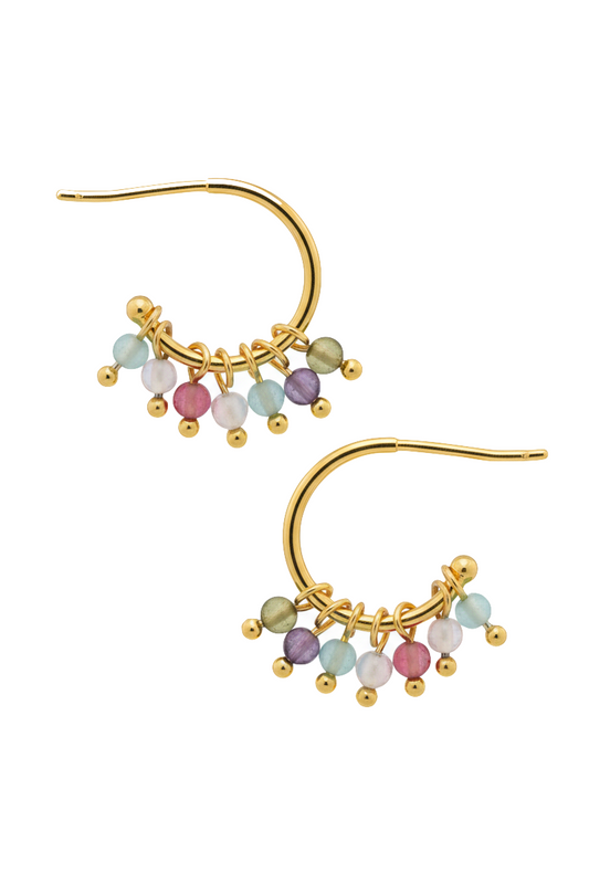 Gold earrings with multicolored beads on a white background