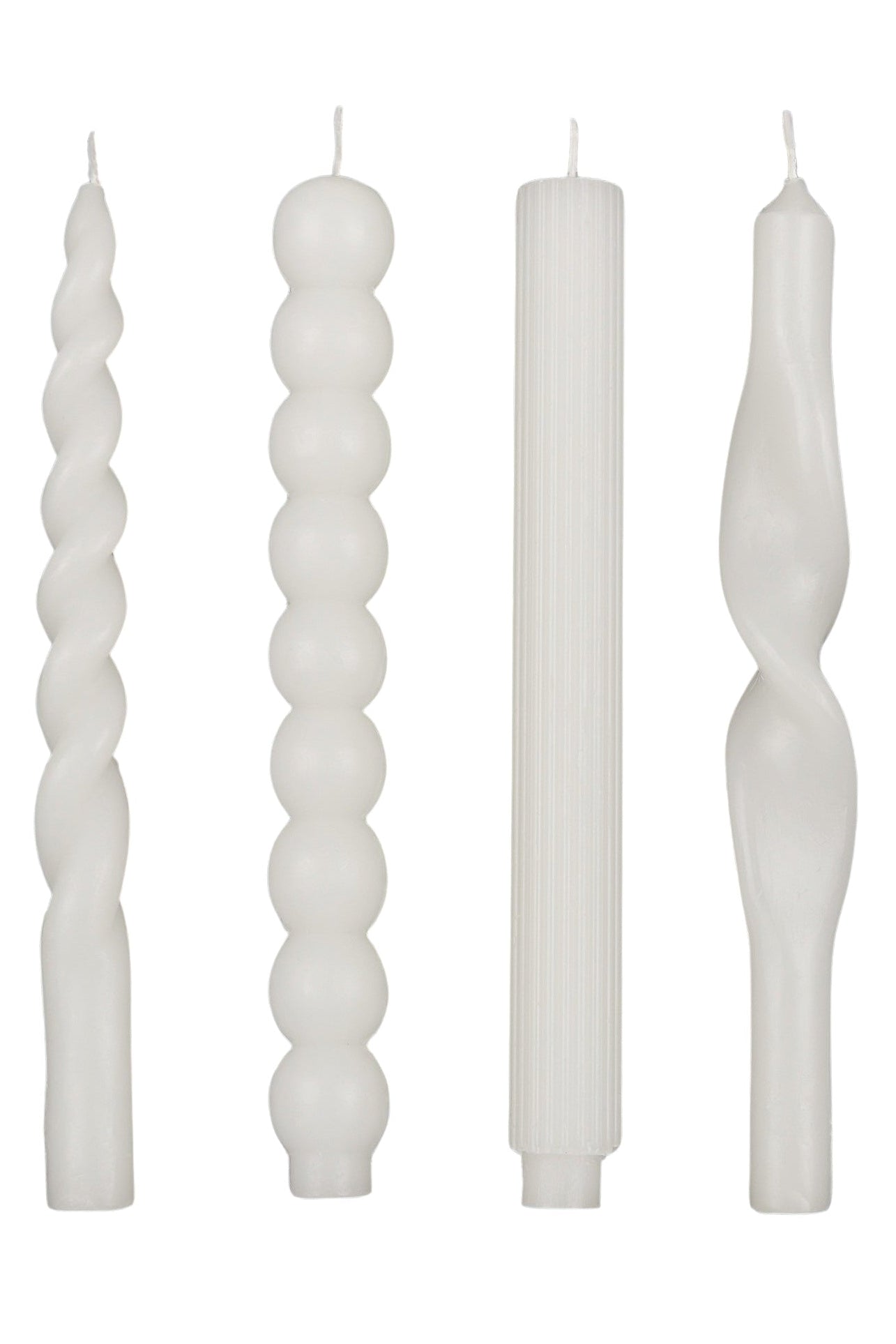 Set of four white twisted candles on a white background