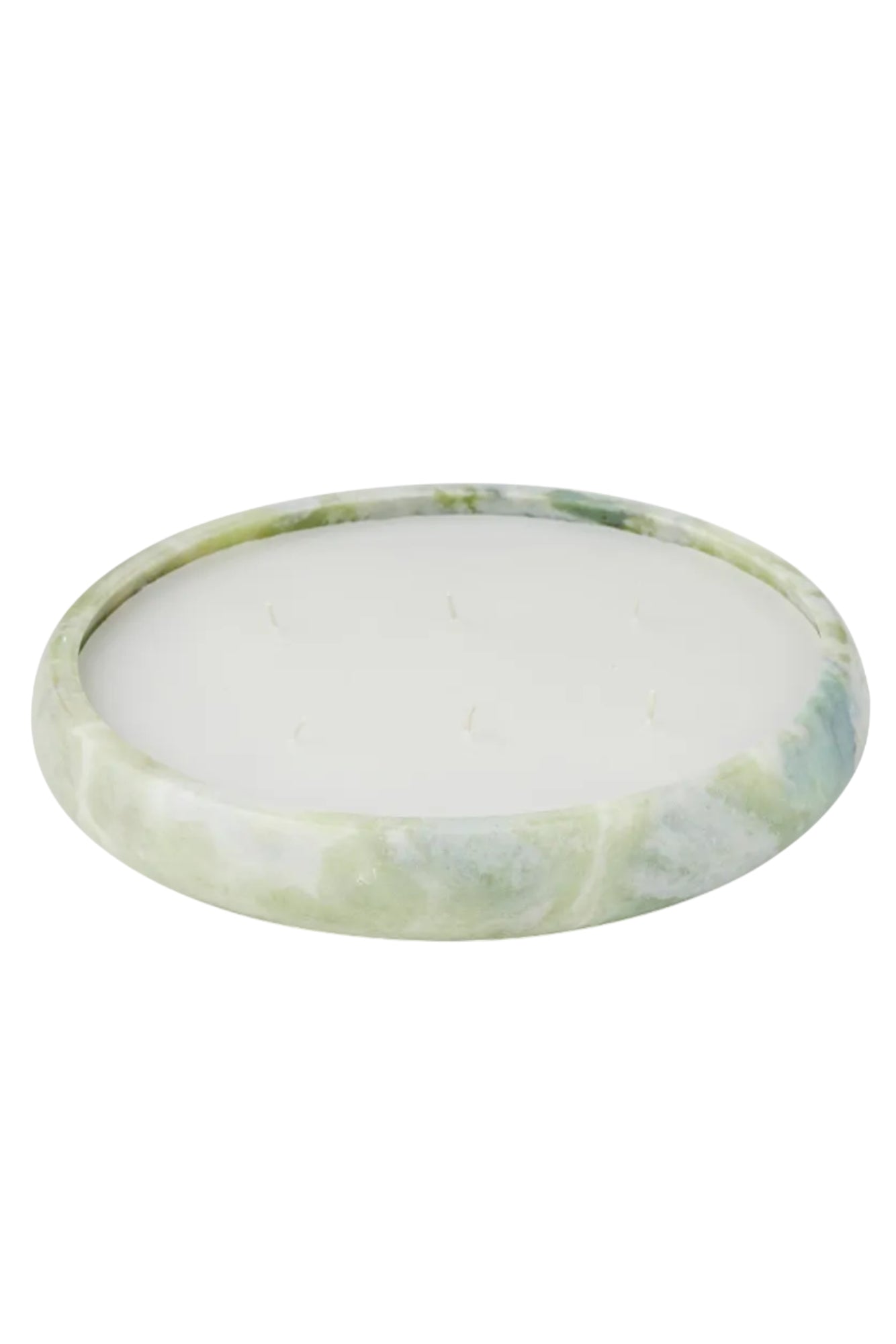 Green marble candle filled bowl on a white background