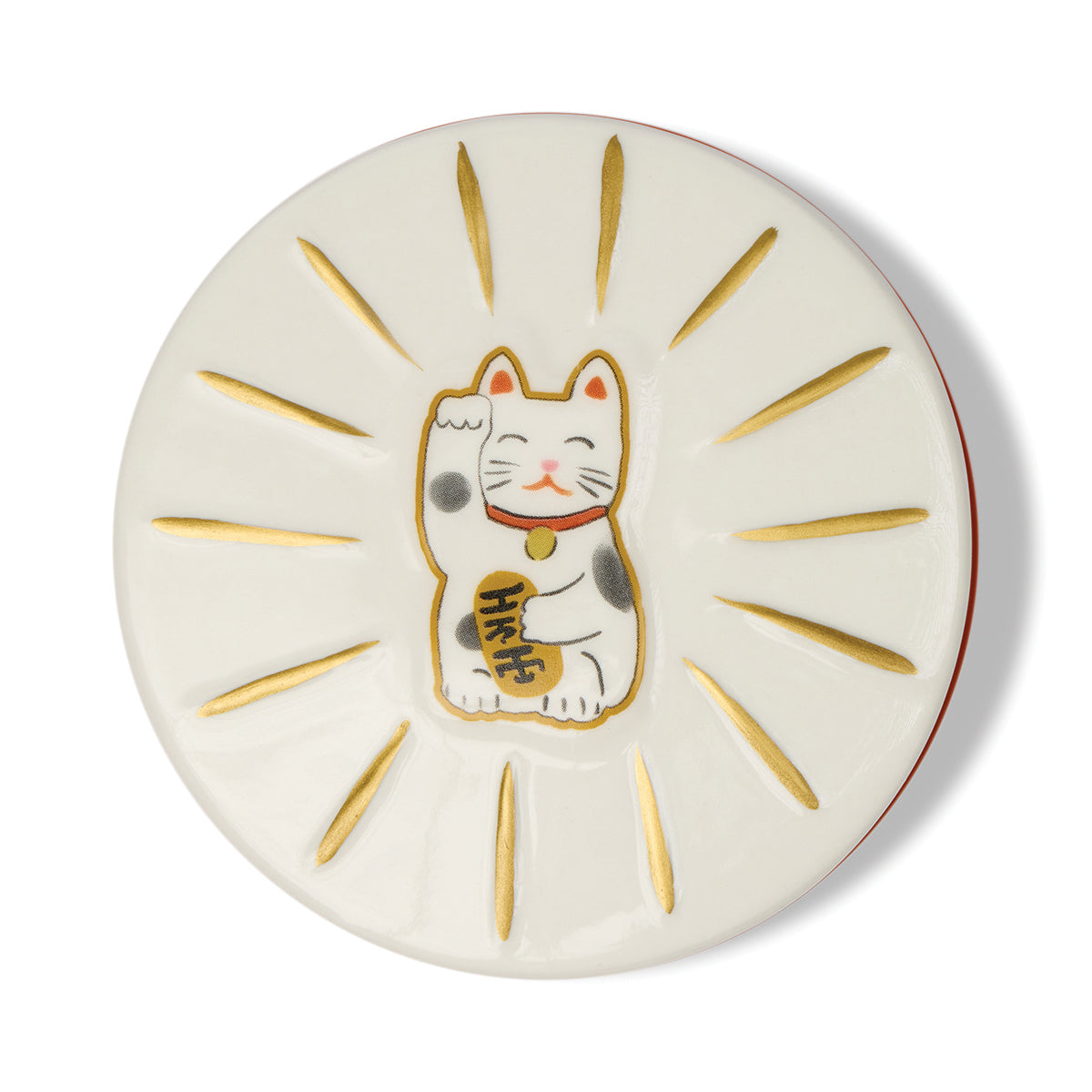Round ceramic plate with a cartoon cat design on a white background