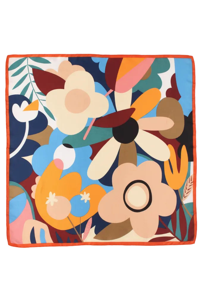Colorful floral patterned fabric square on a white background