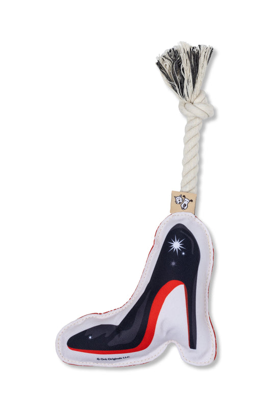 Dog toy shaped like a high-heeled shoe with a rope handle on a white background