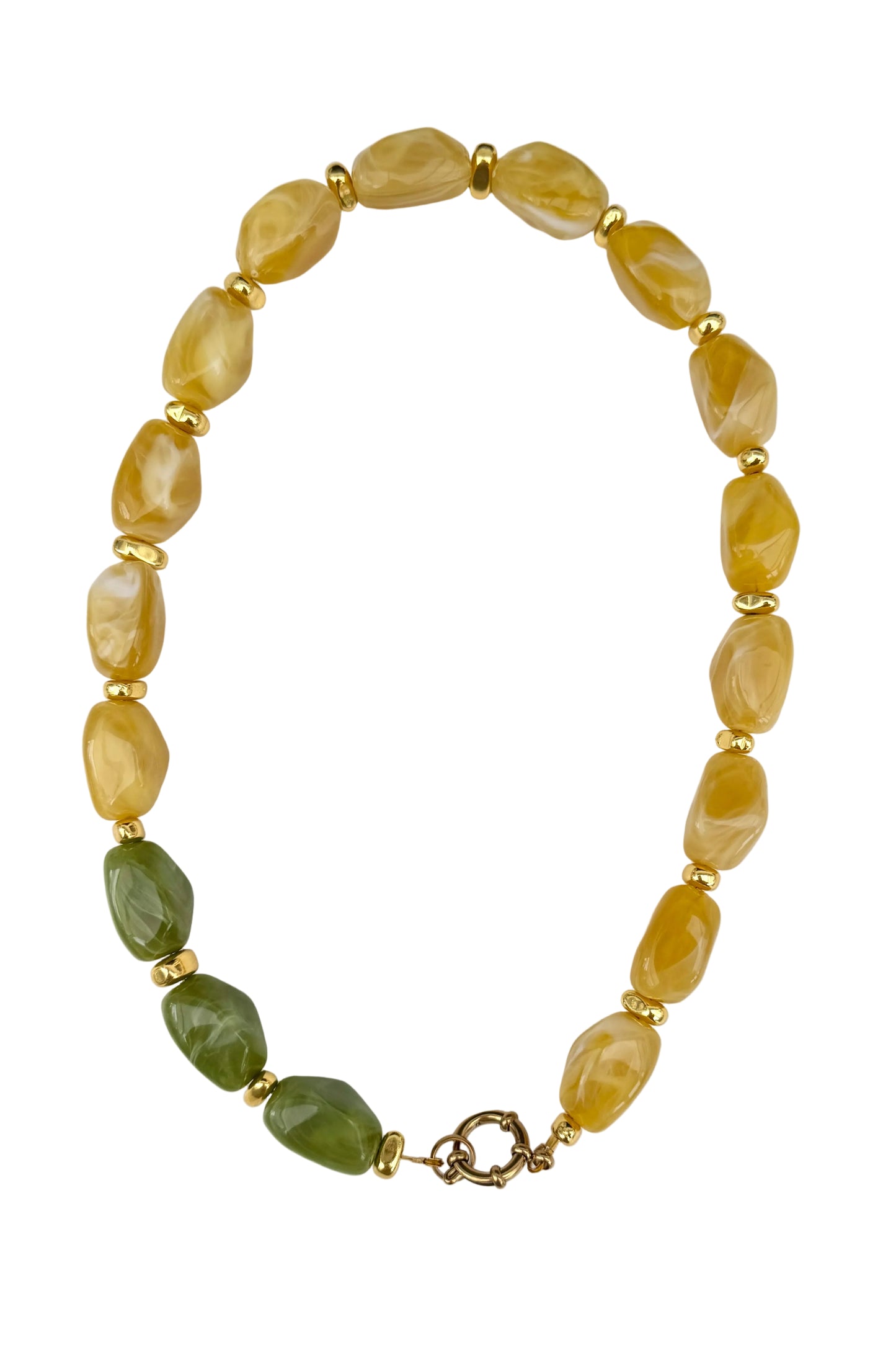 Beaded necklace with yellow and green beads on a white background