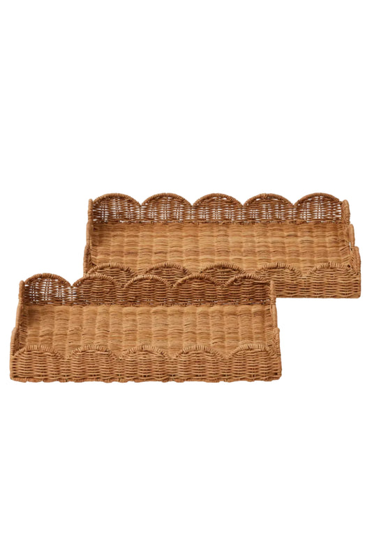 Woven brown tray with scalloped edge on a white background