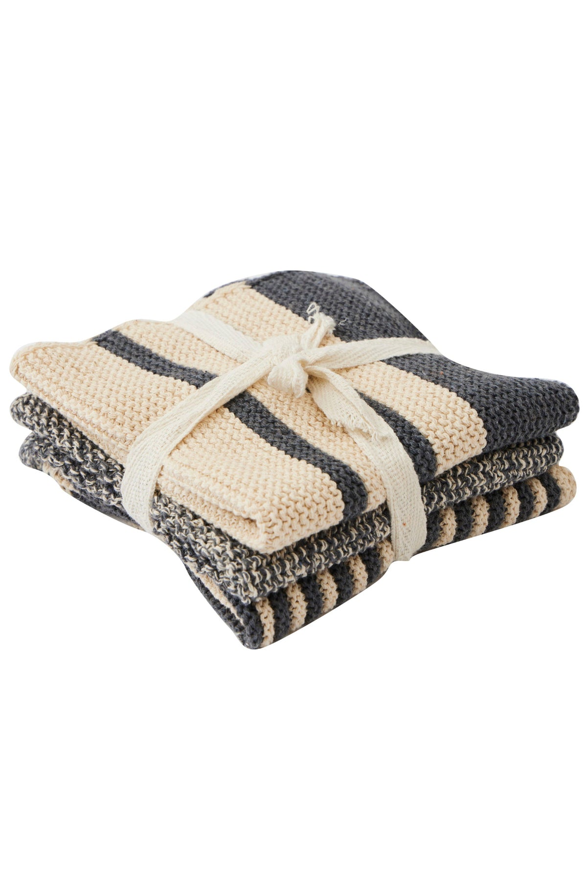 Stack of folded towels with a white ribbon on a white background