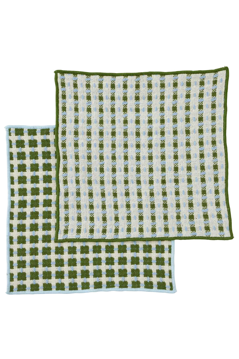 Two green and white checkered towels on a white background