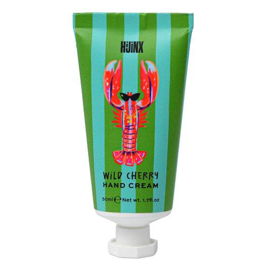 Hand cream tube with a colorful lobster design on a green and blue striped background