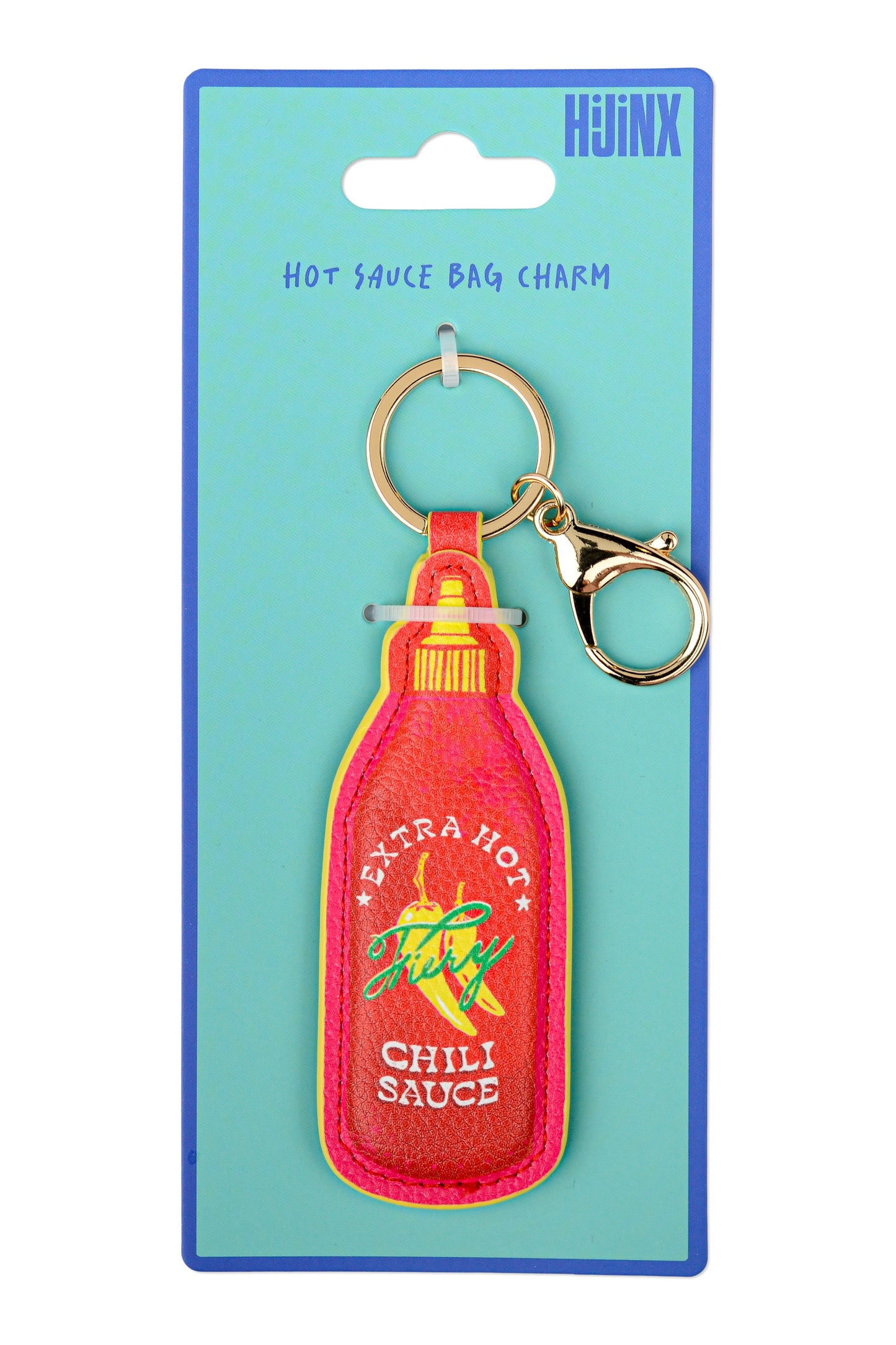 Hot sauce bag charm on a blue card with 'Huinx' branding