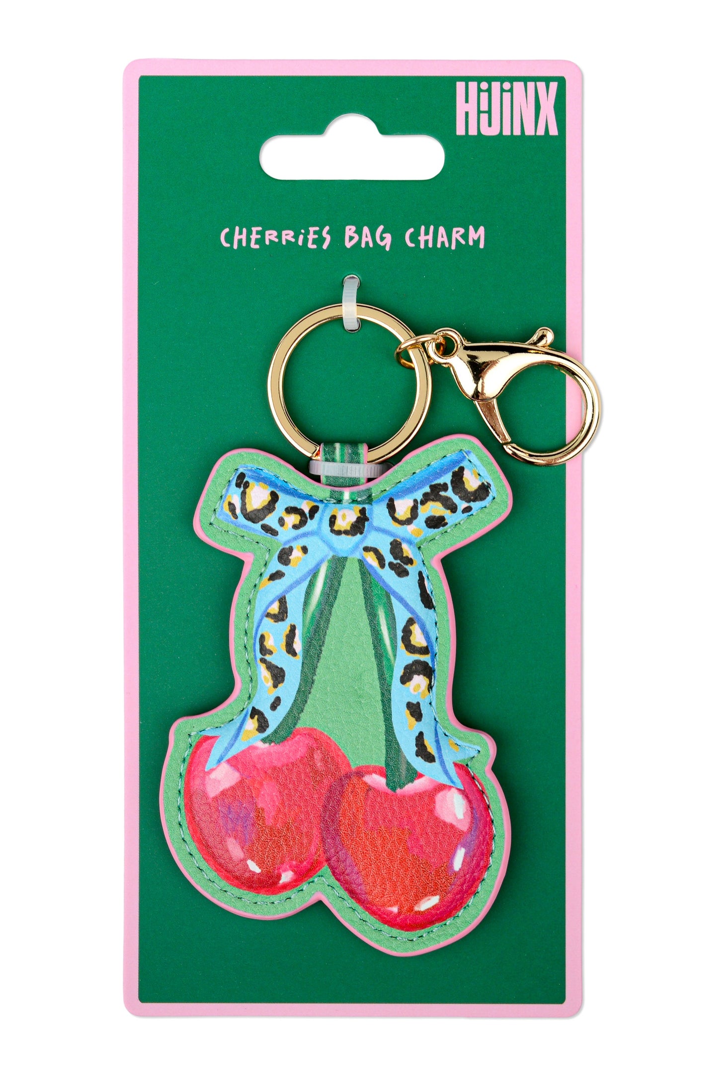 Keychain with cherries and bow design on a green card with 'Huinix' branding.