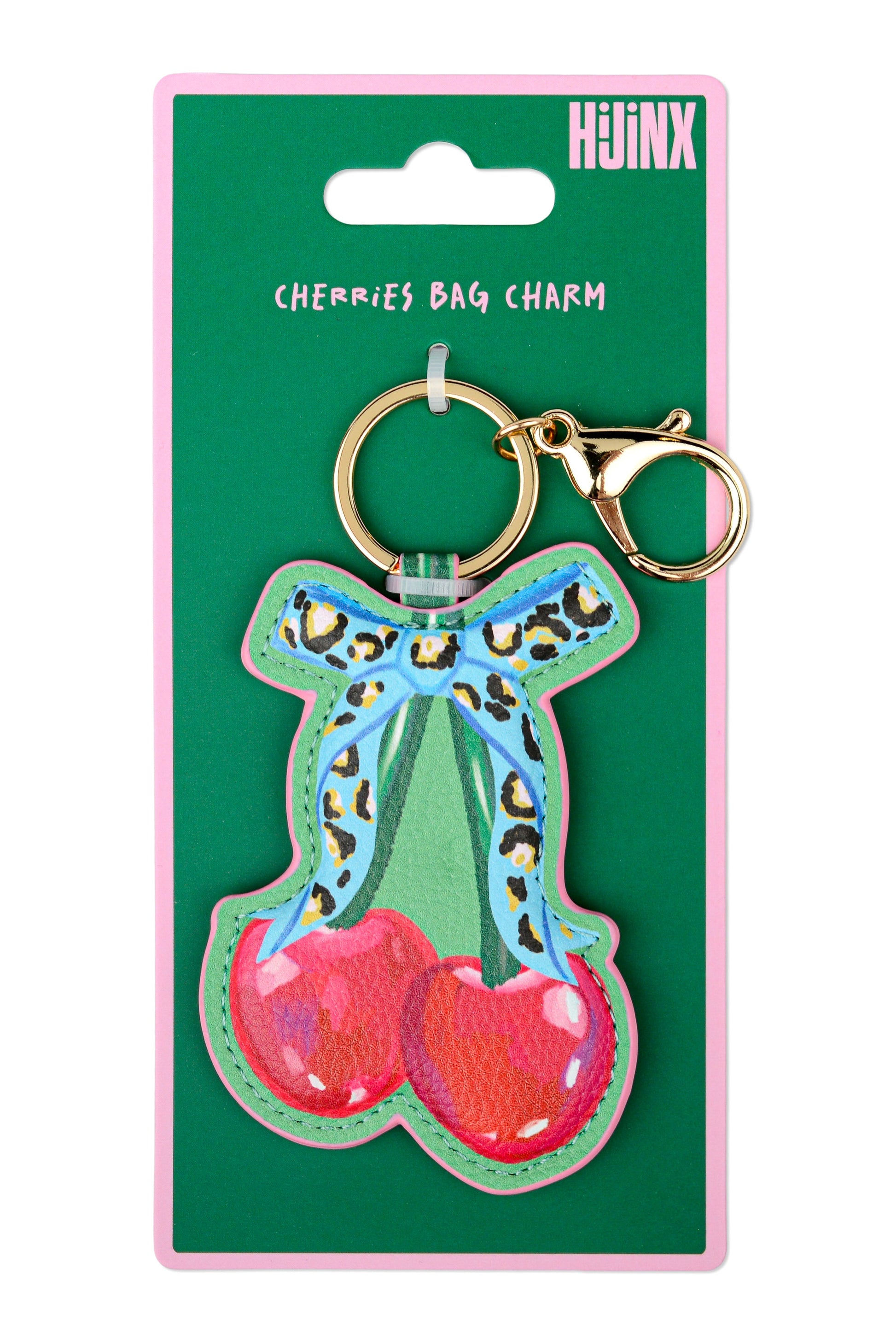 Keychain with cherries and bow design on a green card with 'Huinix' branding.