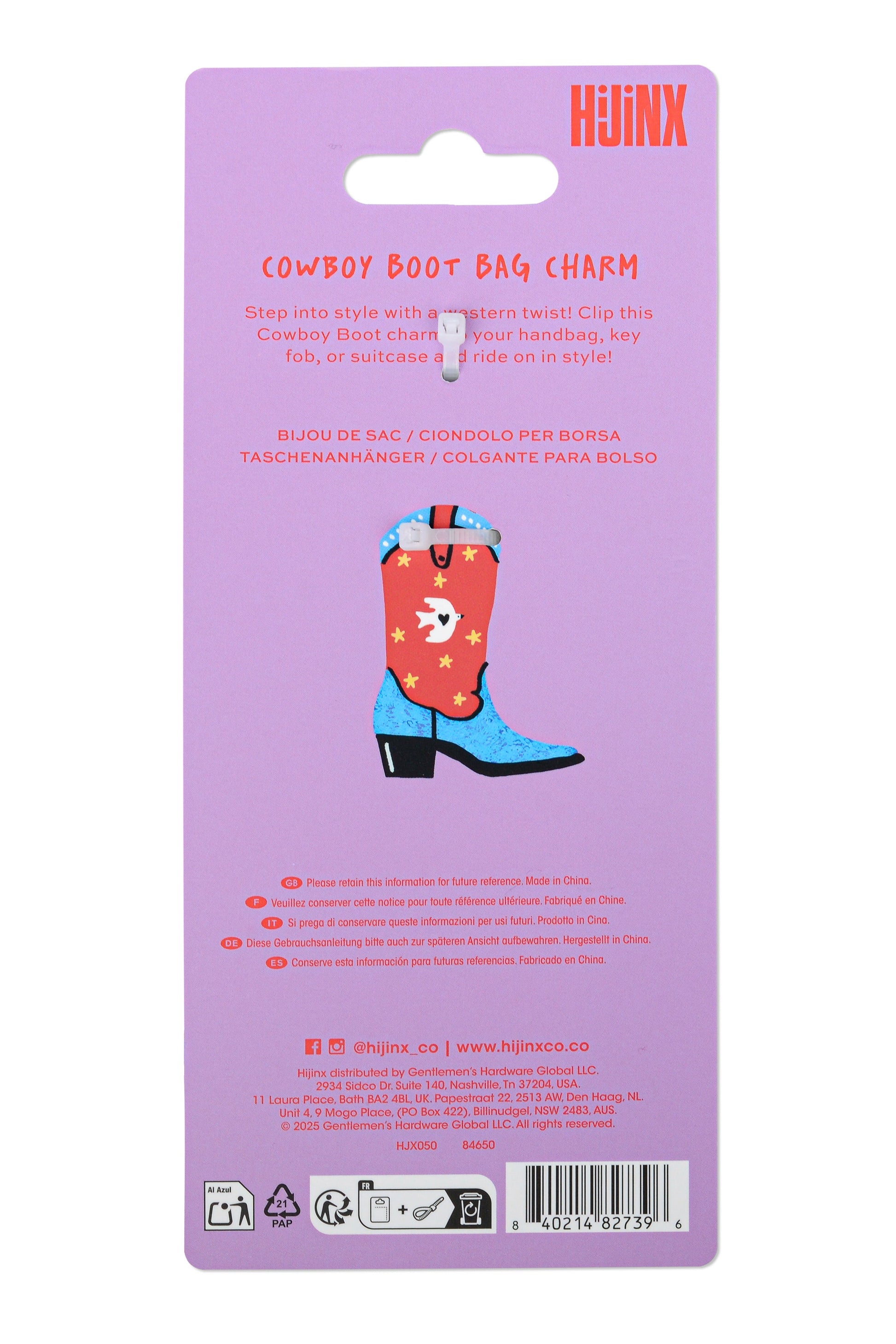 Back of a Jinx brand retail card package for a Cowboy Boot Bag Charm, featuring a purple background, product name in red and pink text, and an illustration of a red cowboy boot charm with blue heels.