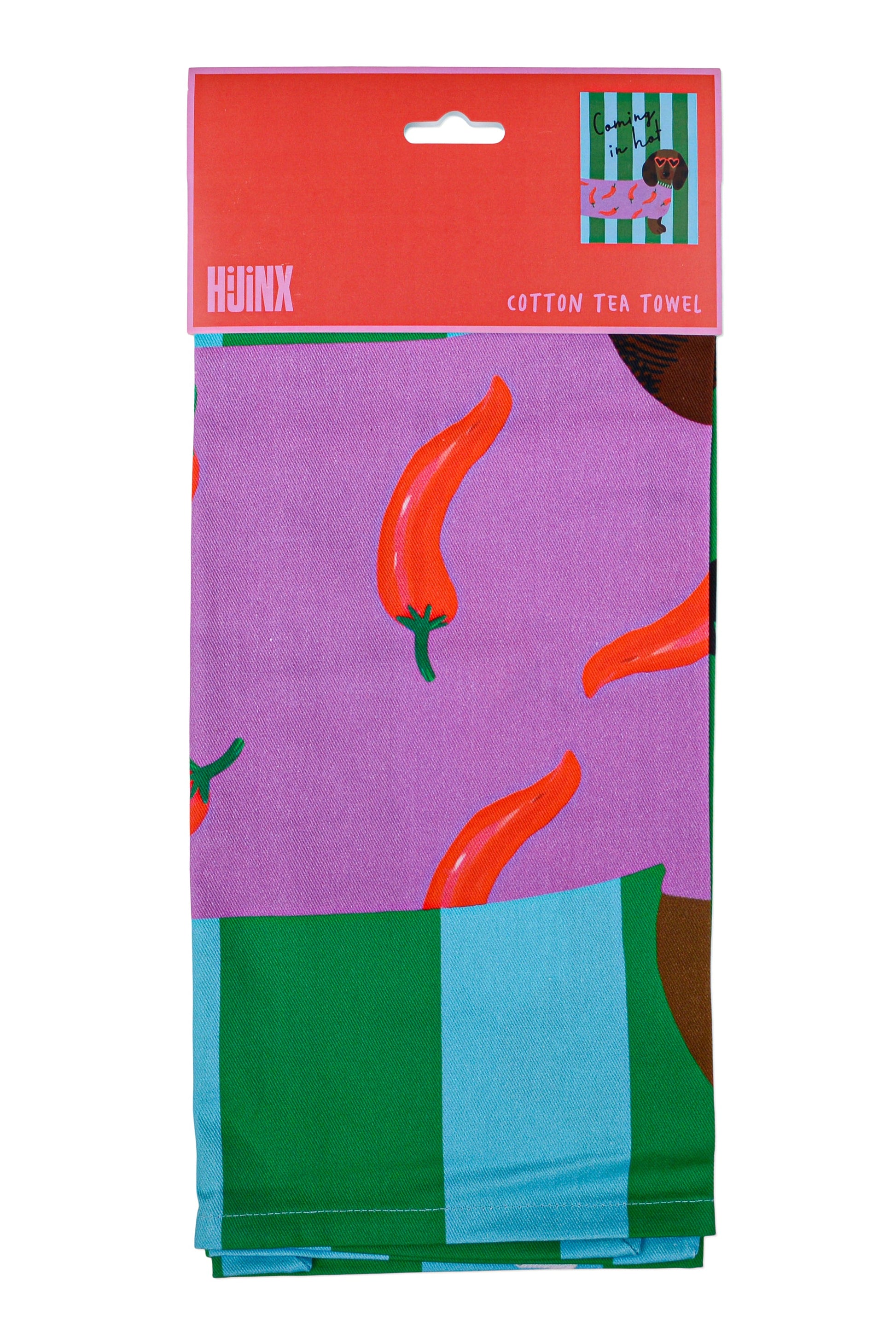 Cotton tea towel with red chili pepper pattern on a purple background, brand 'Hunk' visible.