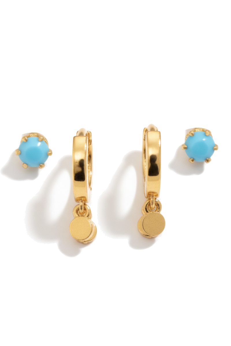 Gold hoop earrings with turquoise stones on a white background