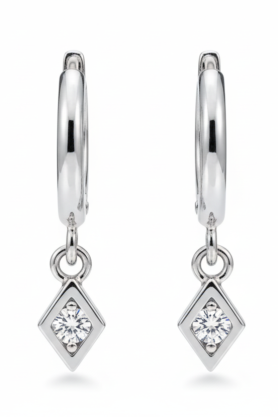 Silver earring with a diamond-shaped pendant on a white background