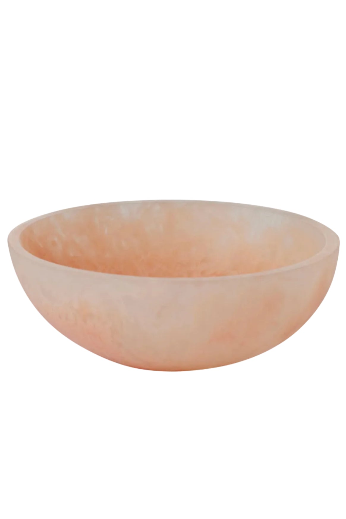 peach coloured resin bowl on a white background