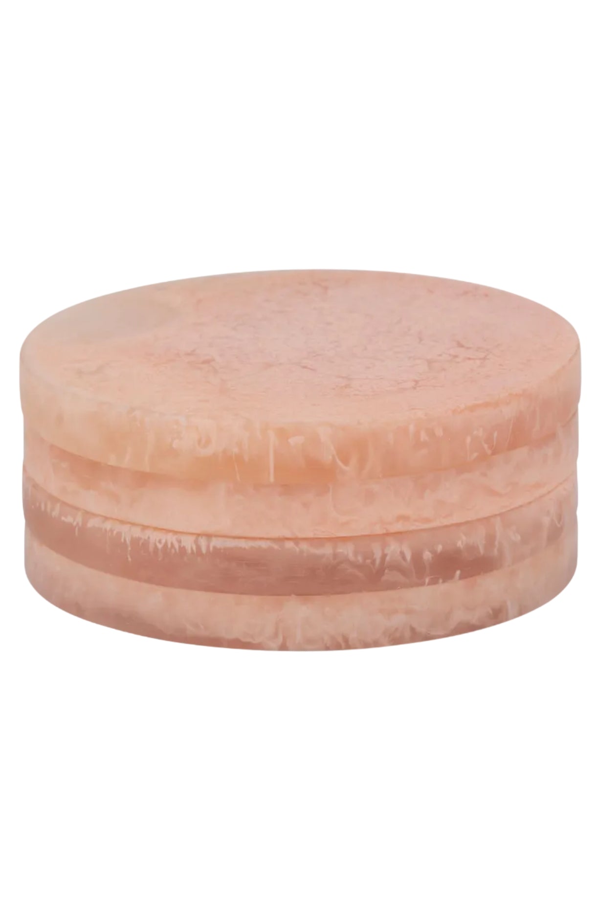 Round pinkish-beige resin coasters on a white background
