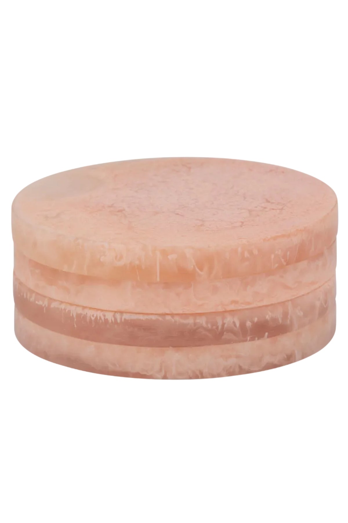 Round pinkish-beige resin coasters on a white background