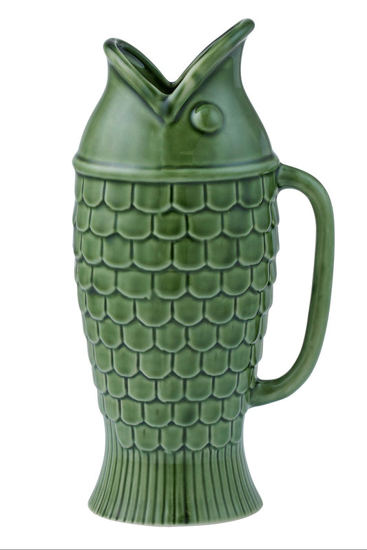Green fish-shaped pitcher on a white background