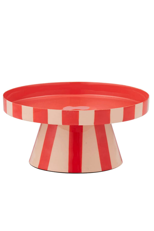 Red and beige striped cake stand on a white background
