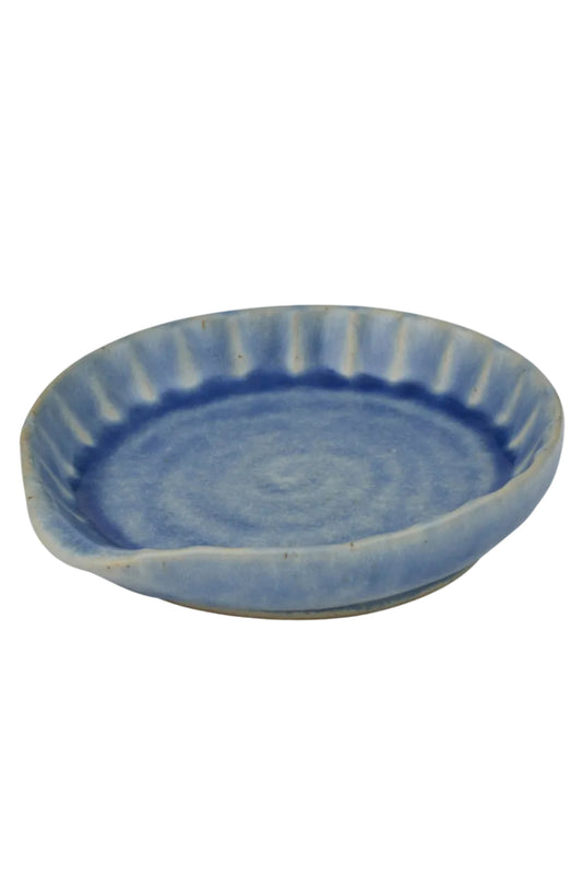 Blue ceramic dish on a white background