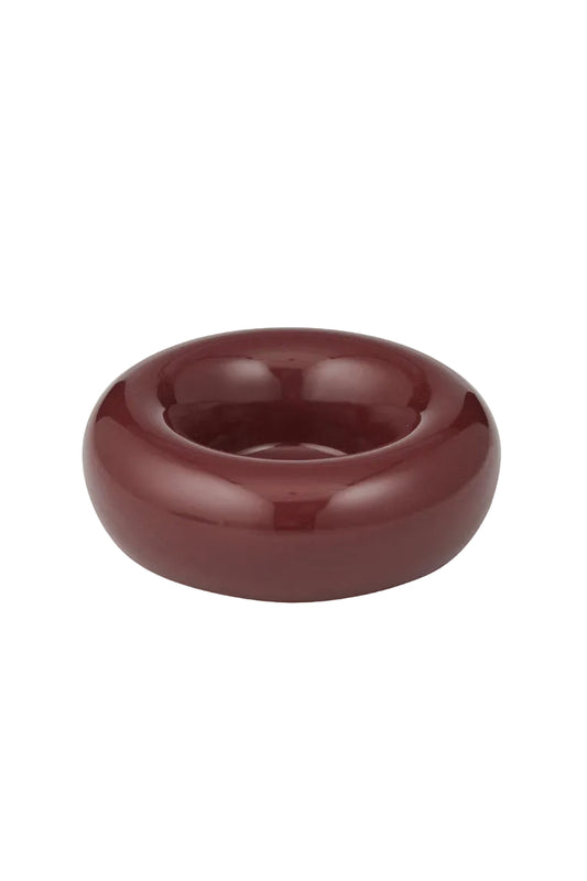 Maroon ceramic bowl on a white background