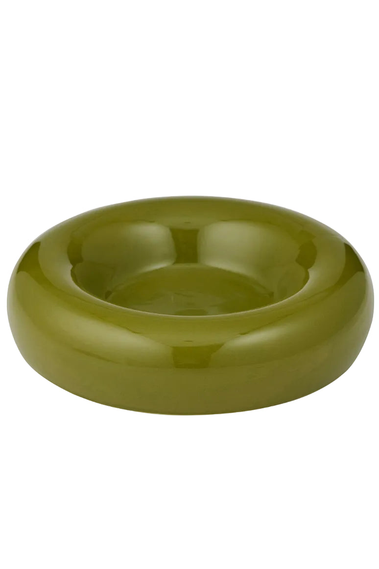 Green ceramic bowl on a white background