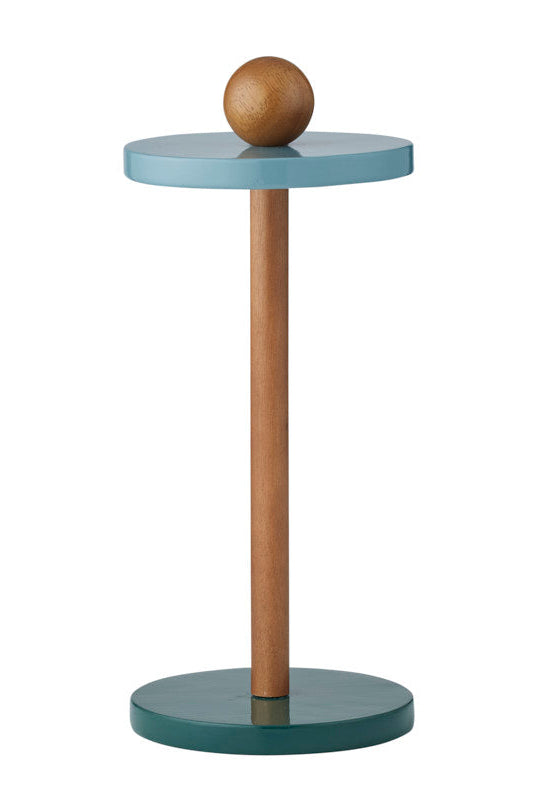 A modern side table with a light blue top, a natural wood pedestal base, and a matching dark teal circular base, shown on a plain white background.