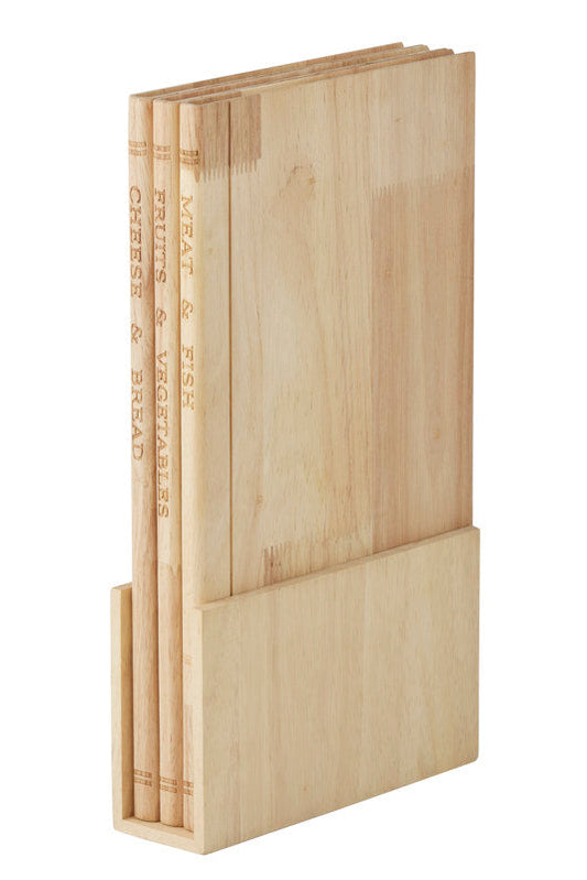 A light natural wood bookcase or holder with several matching wooden boards or panels leaning in a row against it, photographed on a plain white background.