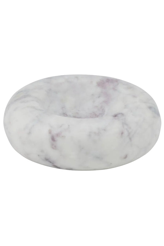 A round, donut-shaped soap dish made of white marble with subtle purple and gray veining, shown on a plain white background.