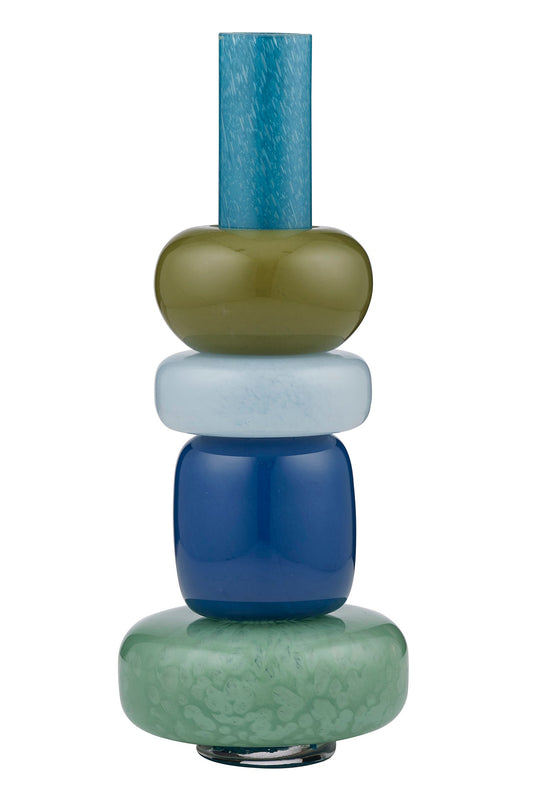 Stacked glass vases in blue, green, and gray on a white background
