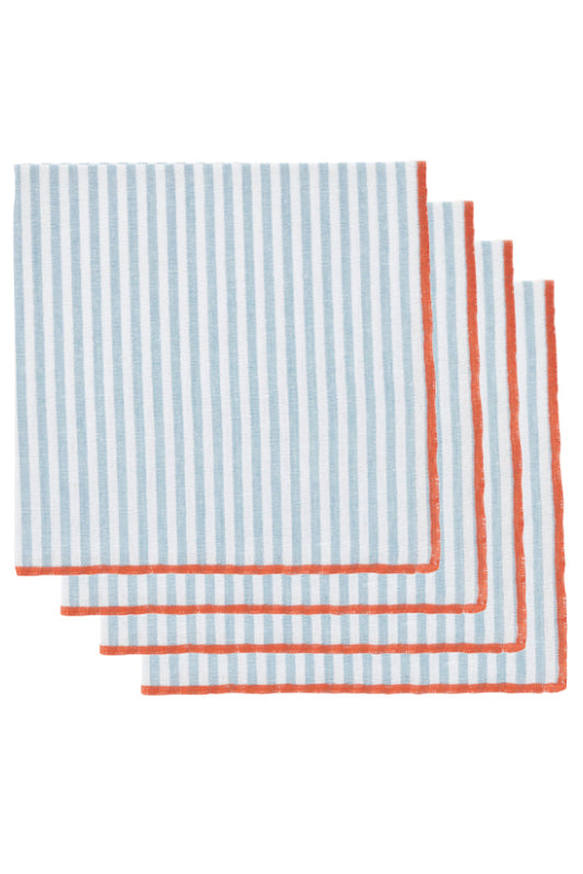 Four square striped cloth napkins with vertical light blue and white stripes and a thin orange border, arranged in a stacked fan layout on a white background.