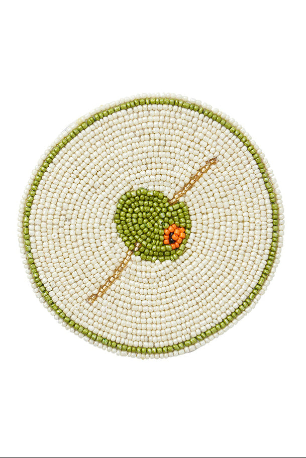 round beaded coaster with olive design on a white background