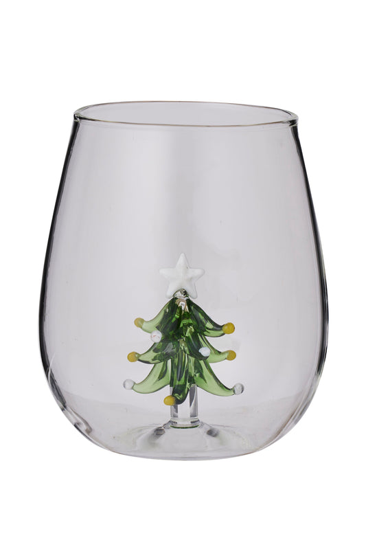 A clear stemless wine glass featuring a decorative green glass Christmas tree with a white star topper, set against a plain white background.