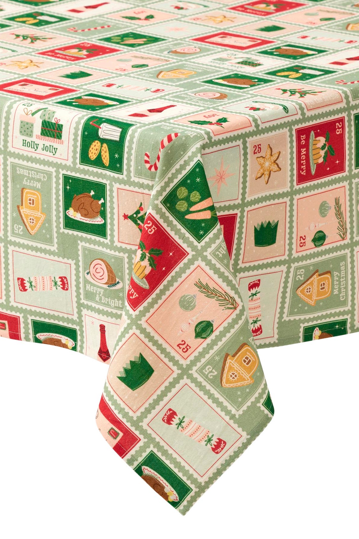 A festive Christmas-themed tablecloth featuring a patchwork design of red, green, and cream squares with holiday illustrations such as turkeys, gingerbread houses, candy canes, and reindeer.