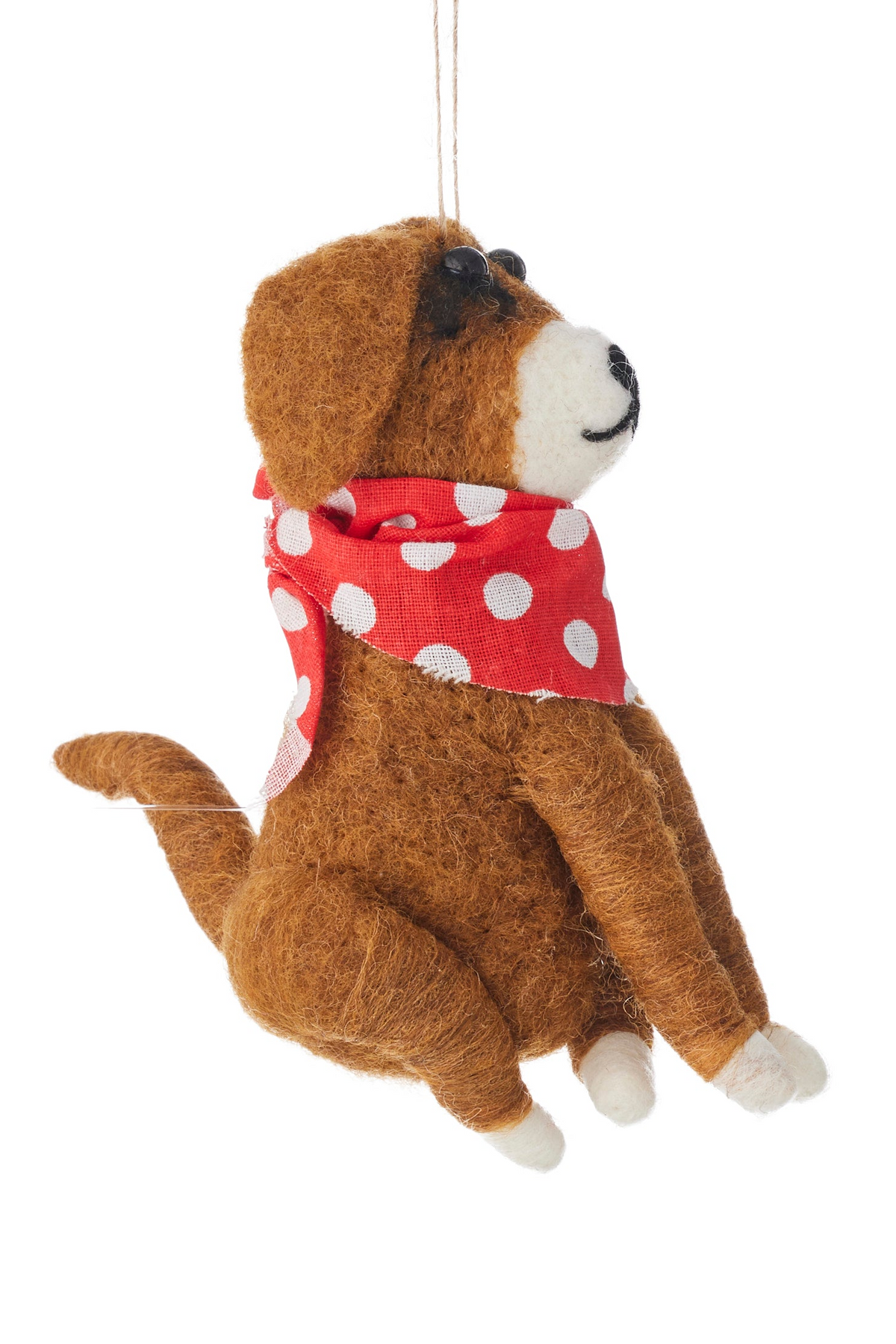 Two felt dog ornaments hanging side by side on a white background. The left ornament is brown with a red polka-dot scarf, and the right ornament is white with black spots, wearing a mint green sweater and holding a small green wreath with white flowers.