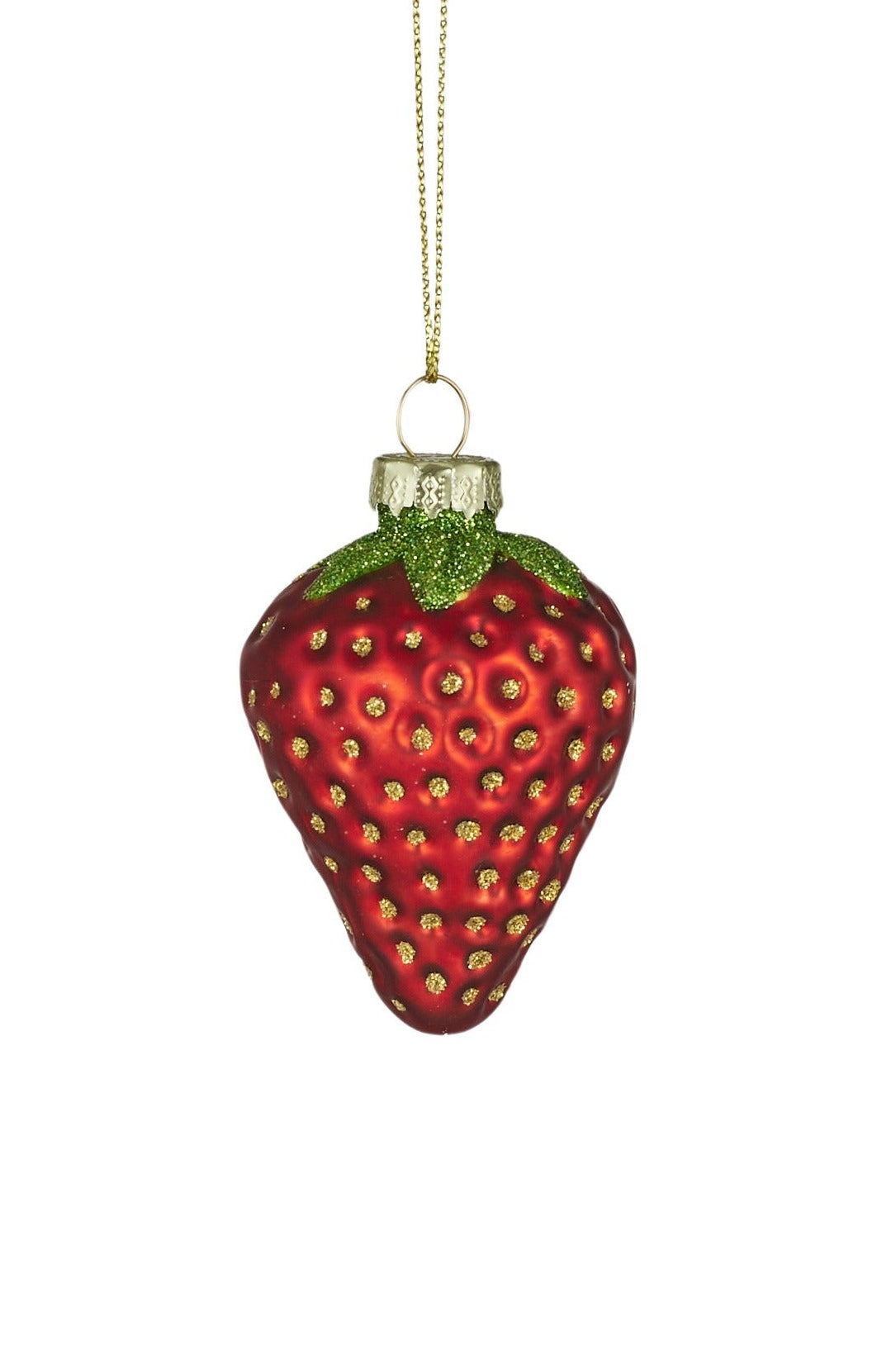 A red strawberry-shaped Christmas ornament with green leafy top and small yellow seeds, hanging from a gold string against a plain white background.