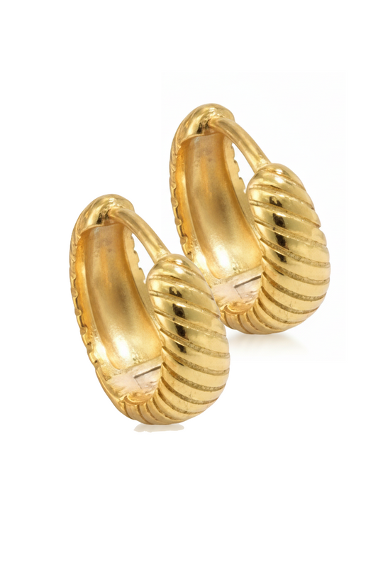 Pair of gold hoop earrings on a white background